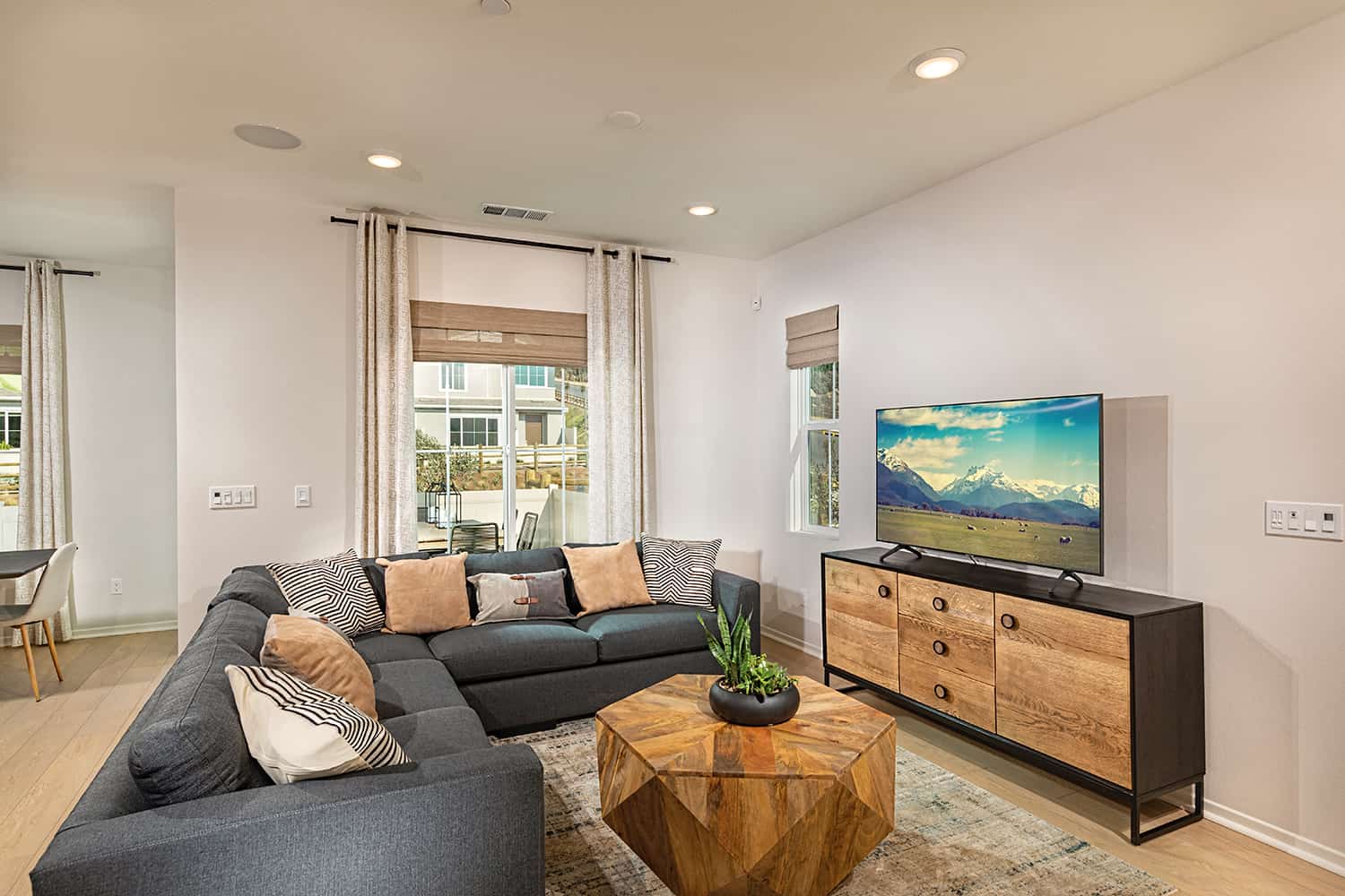 A living room with a couch and television