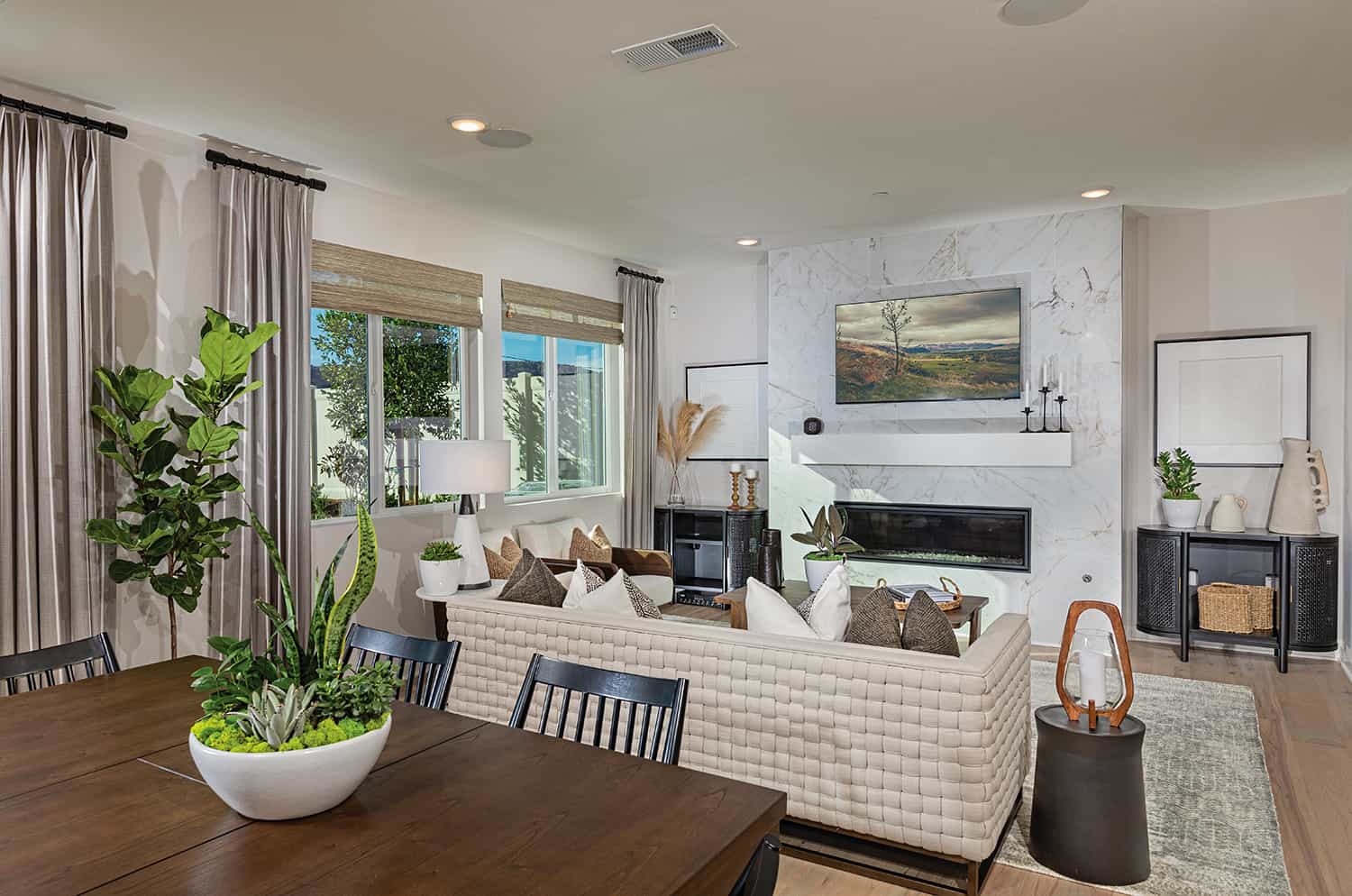 A living room with a couch and table